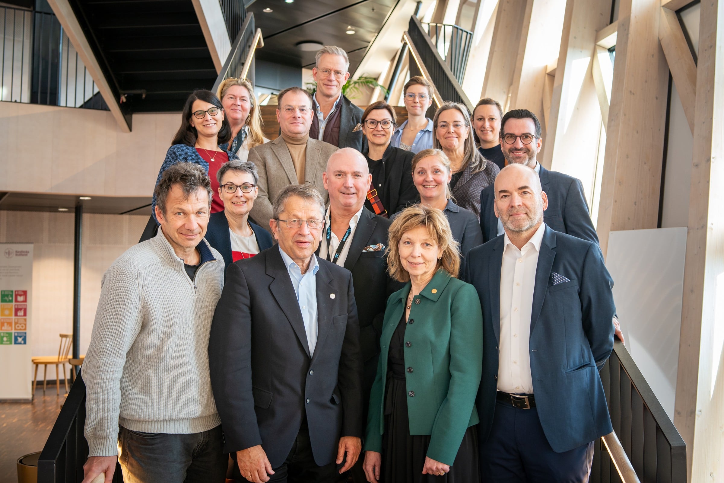 A group of people standing next to each other.